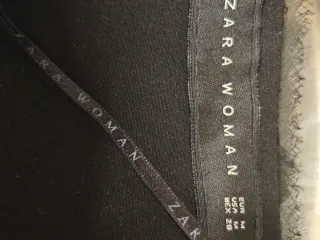 Chaqueta fiesta lentejuelas negra y plateada