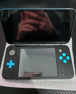New Nintendo 2DS XL + 96 juegos instalados