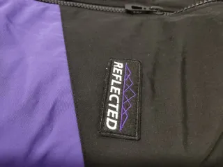 Chaqueta Bershka Negra y Morada