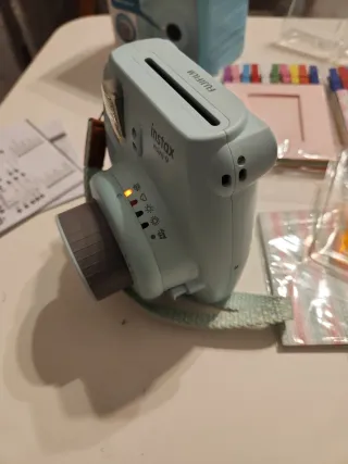 Cámara Instax Mini 9 con muchos Accesorios