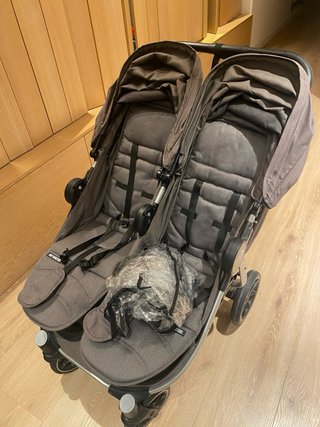 Silla gemelar Baby Monster con capazos y funda