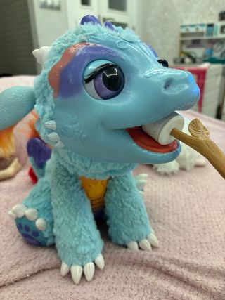 Juguete interactivo de dragón azul