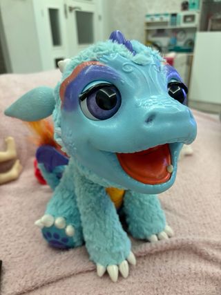 Juguete interactivo de dragón azul