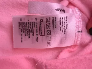 Sudadera rosa con perro