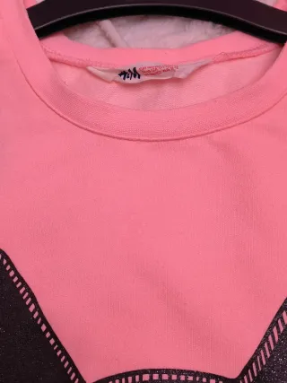 Sudadera rosa con perro