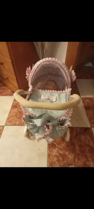 Carrito de muñecas azul y rosa