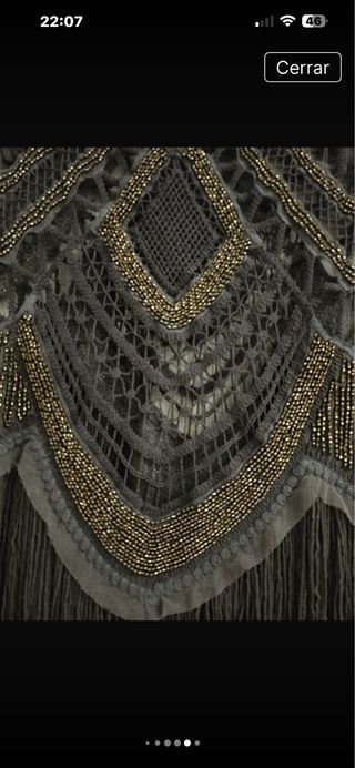 Top calado con flecos y pedrería