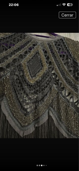 Top calado con flecos y pedrería