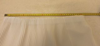 Falda blanca plisada