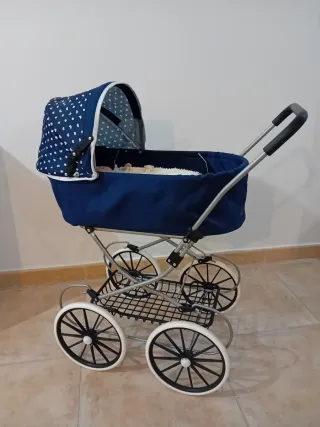 Muñeca Reborn con Ropa y Cochecito