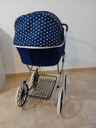 Muñeca Reborn con Ropa y Cochecito