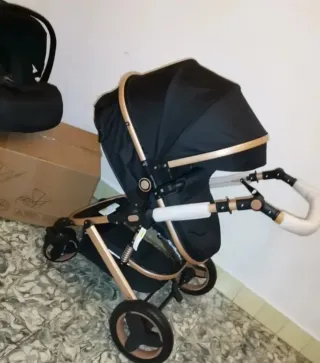 Carrito de bebé y silla coche negro