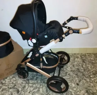 Carrito de bebé y silla coche negro