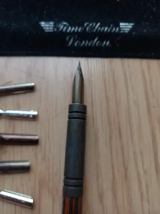 Pluma Time Chain London con puntas vintage