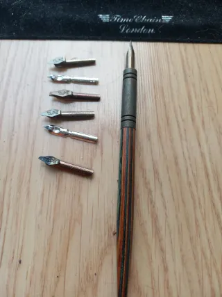 Pluma Time Chain London con puntas vintage