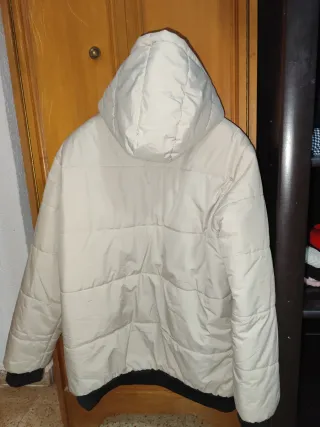 Chaqueta acolchada beige y negra hombre
