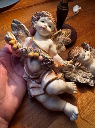 2 Querubines de Resina con Frutas