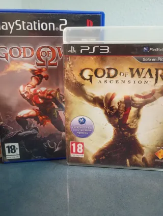Lote God of War PS2, PS3 y Figura Funko Pop