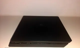 PS4 Slim Sony Negra + Dualshock 4 blanco + Juegos