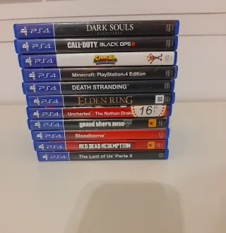 PS4 Slim Sony Negra + Dualshock 4 blanco + Juegos