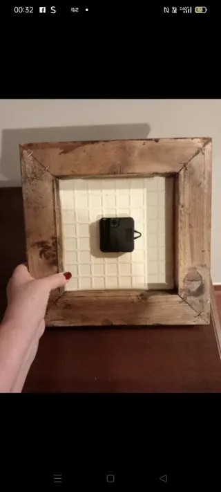 Orologio da parete con numeri romani