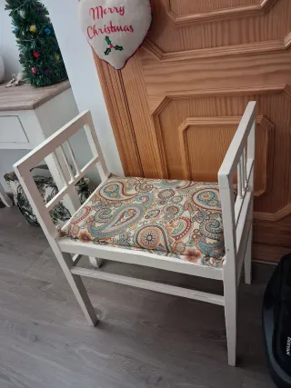 Asiento antiguo tapizado