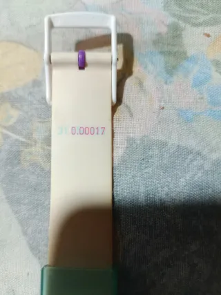 Orologio Swatch Beige e Viola