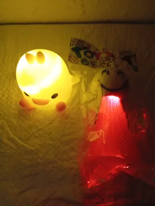 2 muñecos con luces