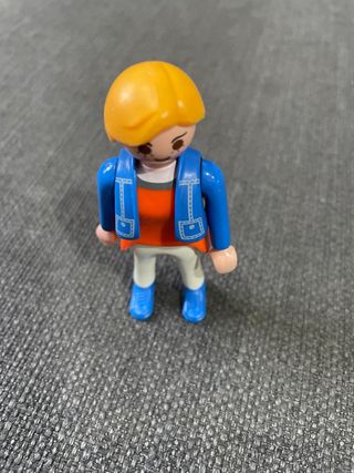 Playmobil chica con chaleco azul