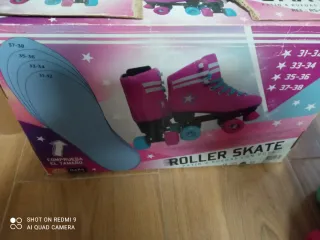 Pattini a 4 ruote rosa e blu