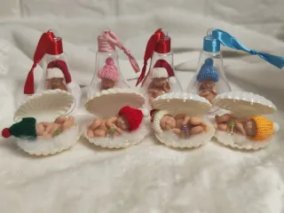 Minis de silicona bebés en conchas