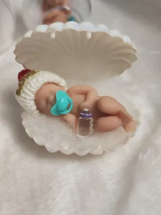 Minis de silicona bebés en conchas