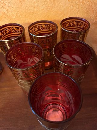 Juego de 12 vasos dorados