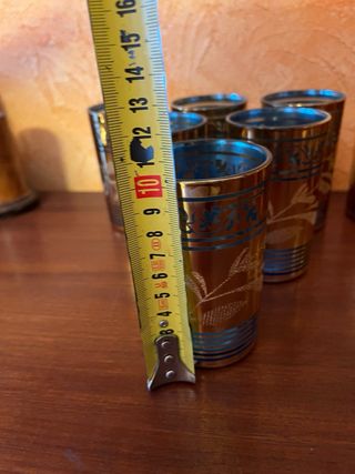 Juego de 12 vasos dorados