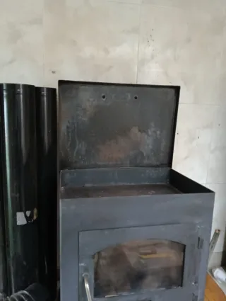 Estufa de leña metal y cristal