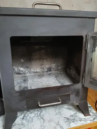 Estufa de leña metal y cristal