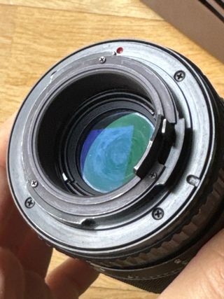 Objetivo Cosinon 135mm 2.8