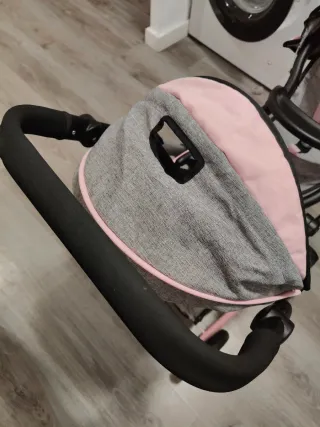 Carro gemelar de juguete gris y rosa