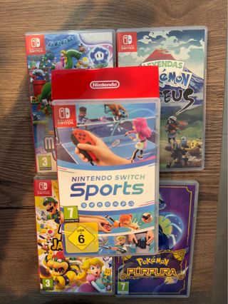 Nintendo Switch OLED + 5juegos + mando extra+funda