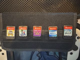 Nintendo Switch OLED + 5juegos + mando extra+funda