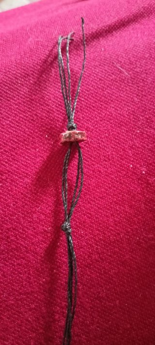 Collana etnica con perline e piume