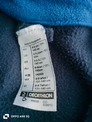 Polar azul con cremallera quechua talla 8-9 años