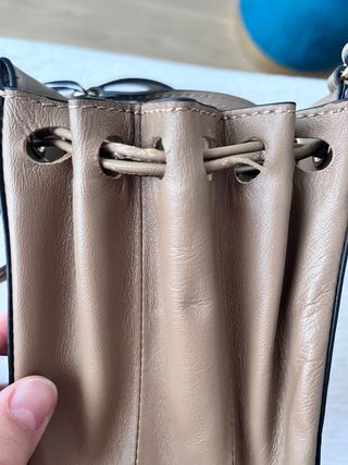 Bolso Uterqüe mini con etiqueta