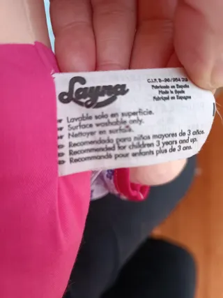 Muñeca de trapo con vestido floral