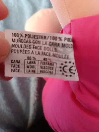 Muñeca de trapo con vestido floral