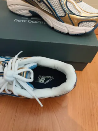 Tênis New Balance 740 - Dourado e Branco