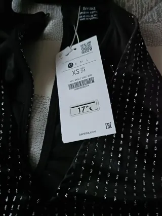 Body brillo. Con etiqueta. Costó 18€