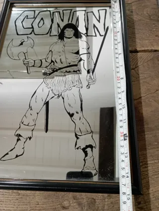 La espada salvaje de Conan el bárbaro. Y espejo