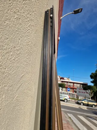 Puerta aluminio con fijo lateral