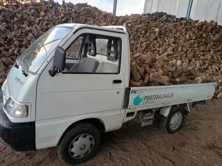 Portes de leña de Olivo en Granada